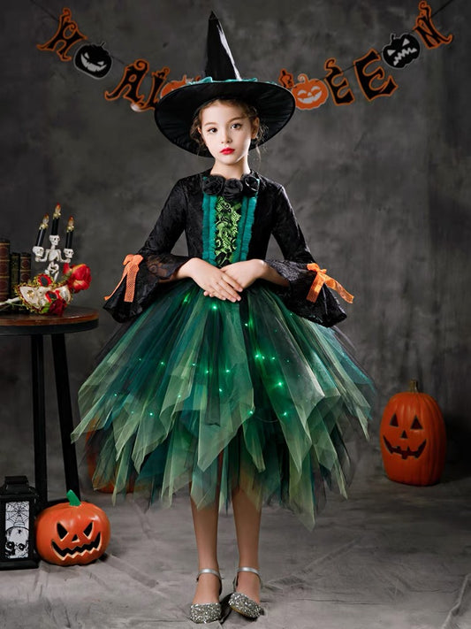 Halloween children's costumes cosplay ; green elves; little girls witches